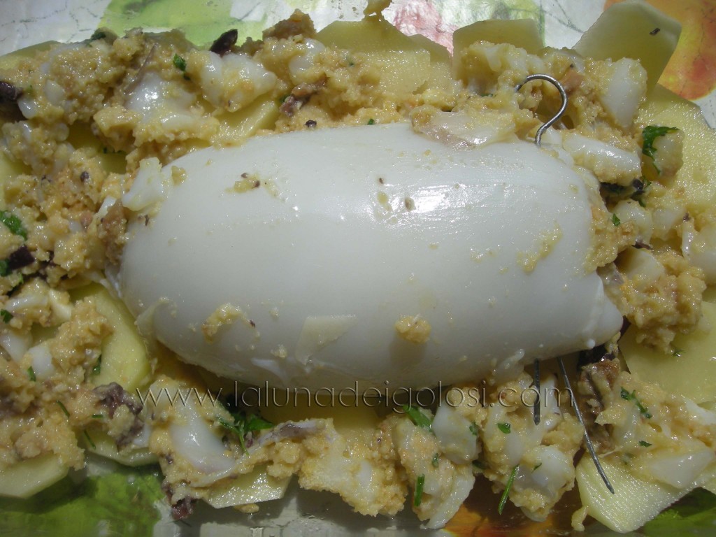 poggia la seppia ripiena sulle patate poggia la seppia ripiena sulle patate