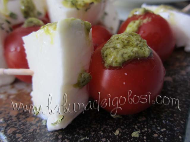 Condisci e aggiungi il pesto